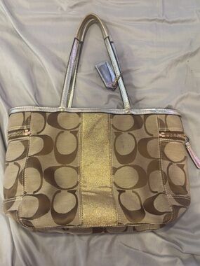 Coach Tan Signature Tote with Gold Metallic Center